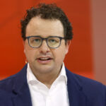 A man wearing glasses