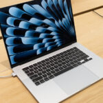 A MacBook plugged into a charger