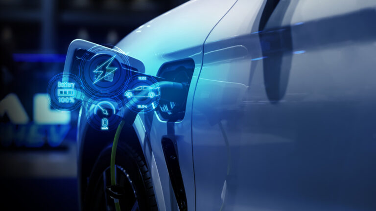 EV at a charging station with charging graphics overlaying the picture in neon blue.