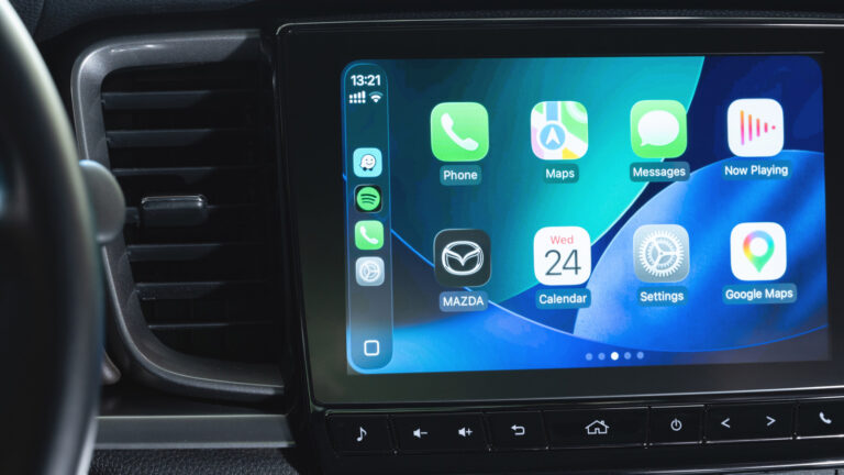 Apple CarPlay splashed across a Mazda dash display.