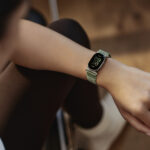 Google's new Fitbit Edge in olive.