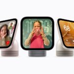Several versions of a device with a smart display attached to a base in a variety of colors.