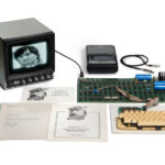 The 'Hatfield' Apple I computer with manuals, keyboard and period accessories