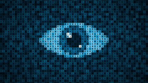stock image showing a blue eye made out of zeros and ones