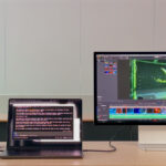 Two Mac Studios connected to a MacBook Pro and a monitor.